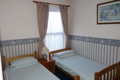 Twin bedroom in Victorian house no. 15