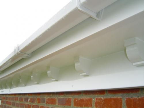 Double Ogee Fascia Boards with Square line gutters and Dentil Moulds