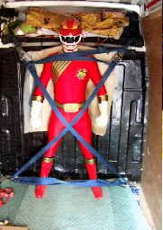 nope not a restrained uniformed member of staff, a power ranger manaquin we transported