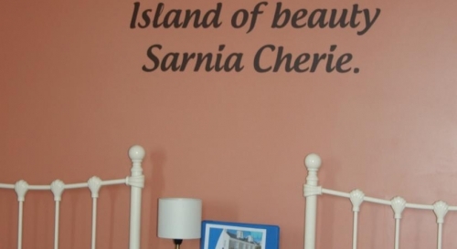 Sea view twin decor, Displaying the Guernseys Anthem name 'Sarnia Cherie'