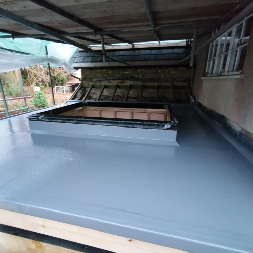Grp flat roofing with skylight in Abergavenny.